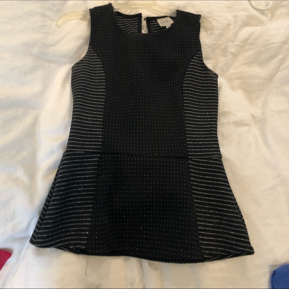 Stylish black and silver peplum top